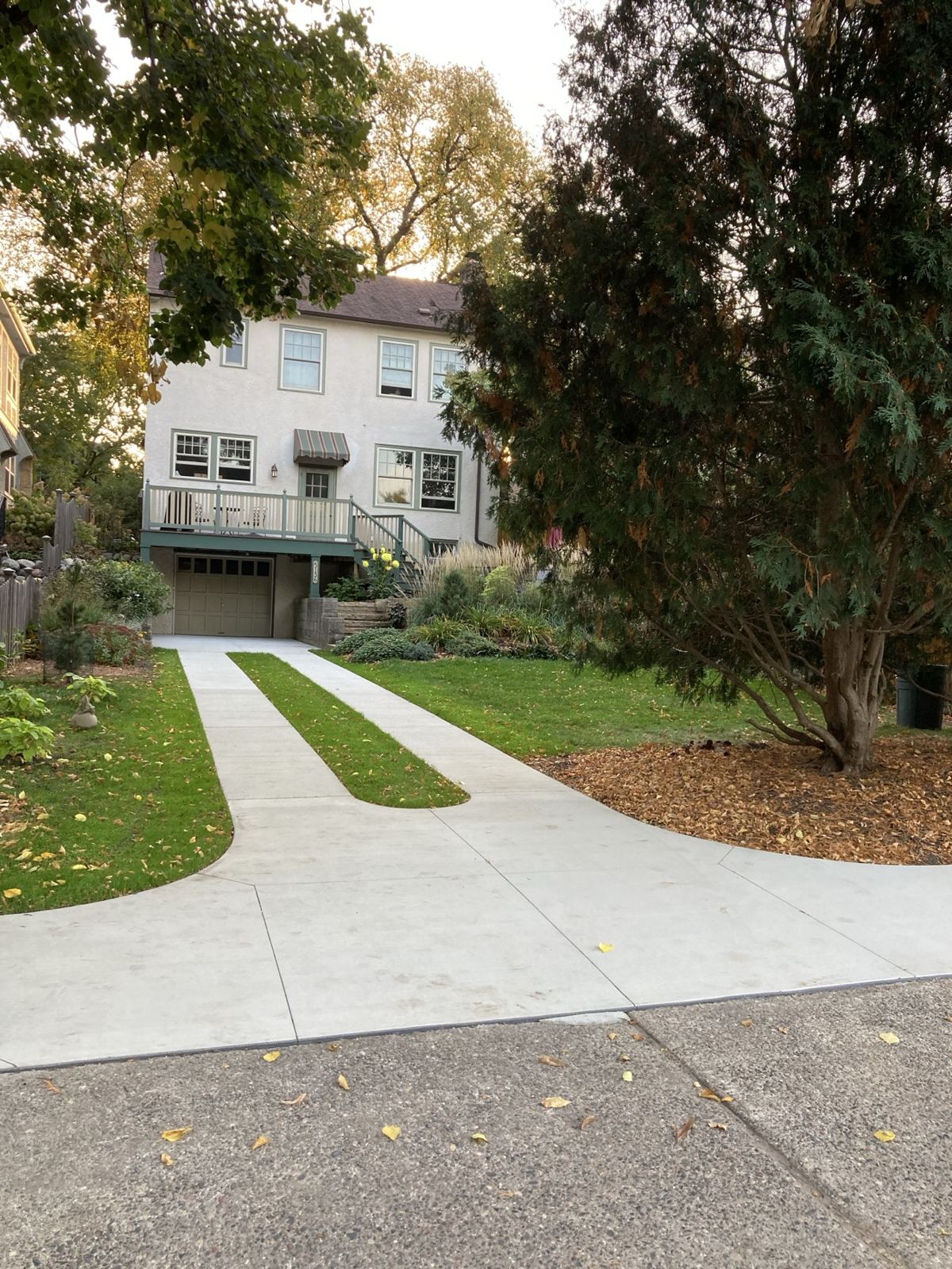 Asphalt Out, Concrete Ribbon Driveway In, after
